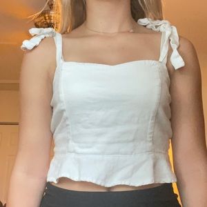 White ruffled tank